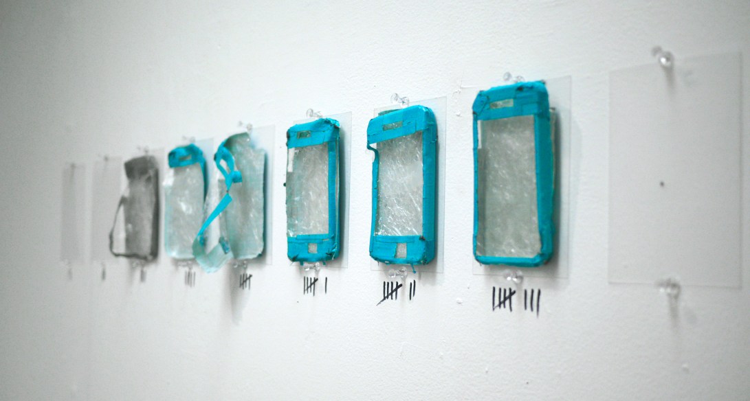 Cell Skins,  duct tape, cellophane, and acetate, 4.5" x 2.31" x 0.37"